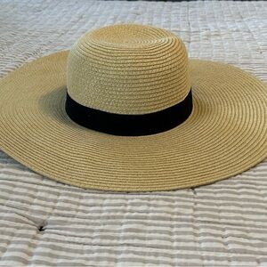 Elegant Tan Wide-Brim Hat with Black Band